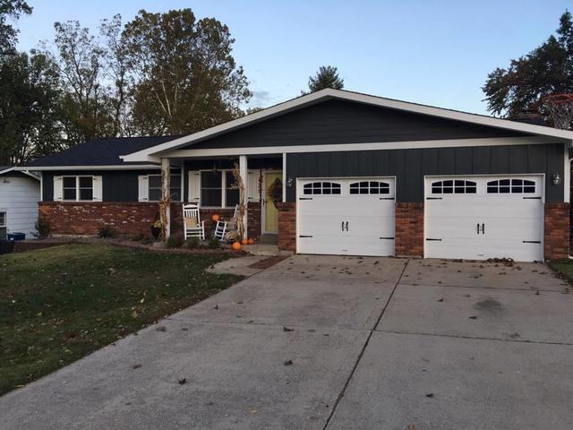 New siding and custom shutters