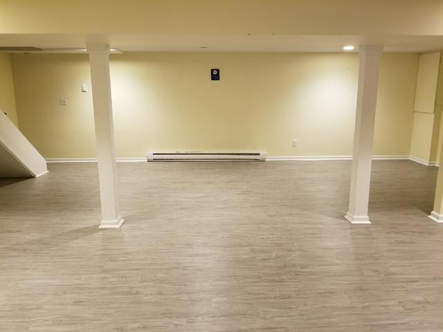 This is how ThermalDry Elite Driftwood looks in the basement, amazing right? Not only does it look incredible, but this product is waterproof so there will be no more worries about seepage through the floors!