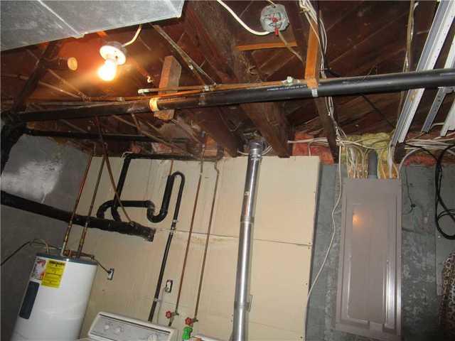 The ceiling in the basement was poorly insulated and needed extra sealing.