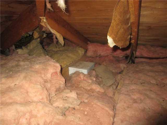 There is some dirt in the insulation and evidence of rodents. Cellulose would solve both of these problems.