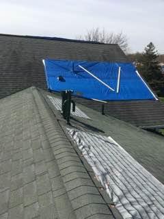 A storm came through and wreaked havoc on this roof.