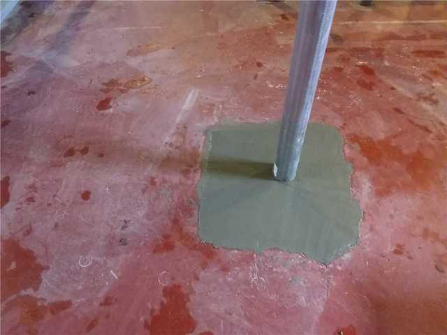 Close up of poured concrete footing for a SmartJack system