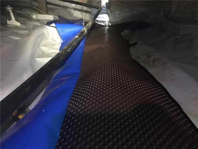 Installation of drainage matting in Gatineau