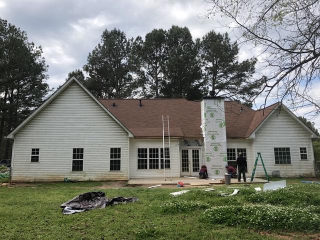 <p>Here&nbsp;we have removed the old porch ceiling. Added house wrap and we are beginning to install new flashing and siding.</p>