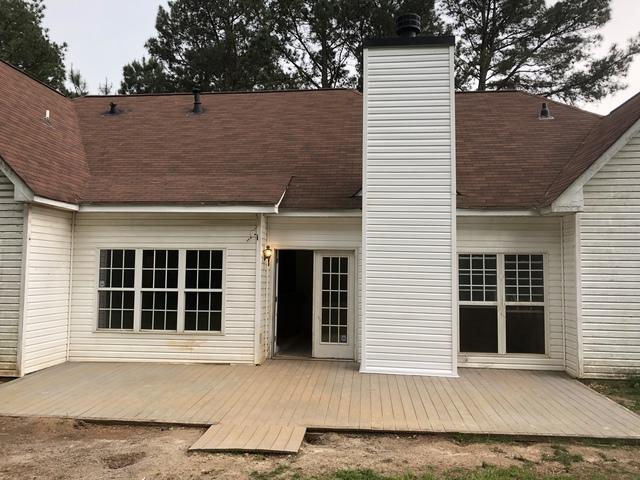 <p>The leaks have been repaired and the new siding has been installed. And the exhaust pipes have been painted a flat black using a high temp paint.</p>