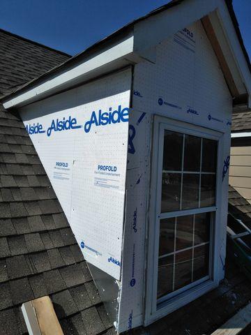 <p>Here is another picture before the siding has been installed. Here we installed&nbsp;some new 1/4" fan fold insulation from Alside</p>