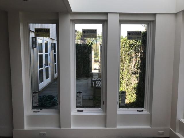 Inside view of the newly installed windows that overlook the porch on the ground floor.