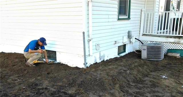 The piers have been installed and the soil around the home has been replaced. The home is now permanently stabilized!