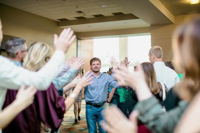 Jack giving "high-fives" at the awards night at Redefine 2018.