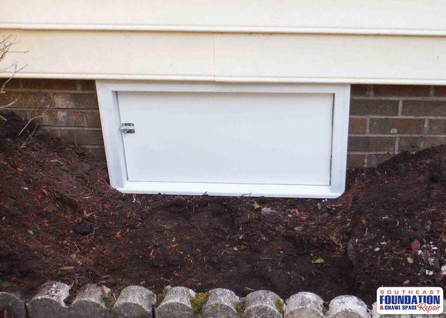 The second crawl space door installed