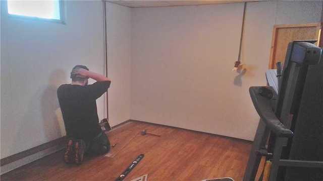 BrightWall Paneling Really Finishes this Basement Off