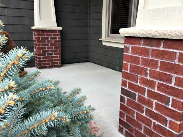 Due to the concrete sinking, the porch had started to slop downward.