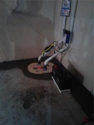 The new Triplesafe sump pump installed in the basement.