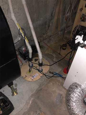 <p>View of the TripleSafe sump pump system we installed in the lowest point of the basement. Our TripleSafe Sump Pump works in 3 scenarios. If Pump 1 fails, Pump 2 takes over. If Pump 1 can't keep up BOTH pumps 1 and 2 operate - a total of 6,200 gallons per hour. If the power fails: Pump 3, a battery operated 'UltraSump', takes over.&nbsp;</p>