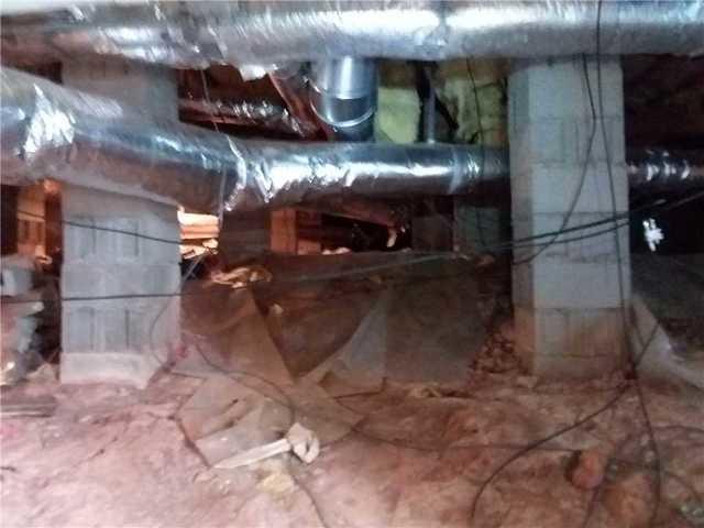 Uncovered Crawl Space Allows Moisture Vapor in Subfloor