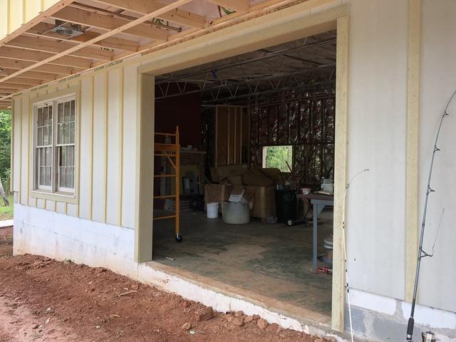 <p>Notice the window change out. This old wood window accented with 1x4's will really look good when the project is finished.</p>