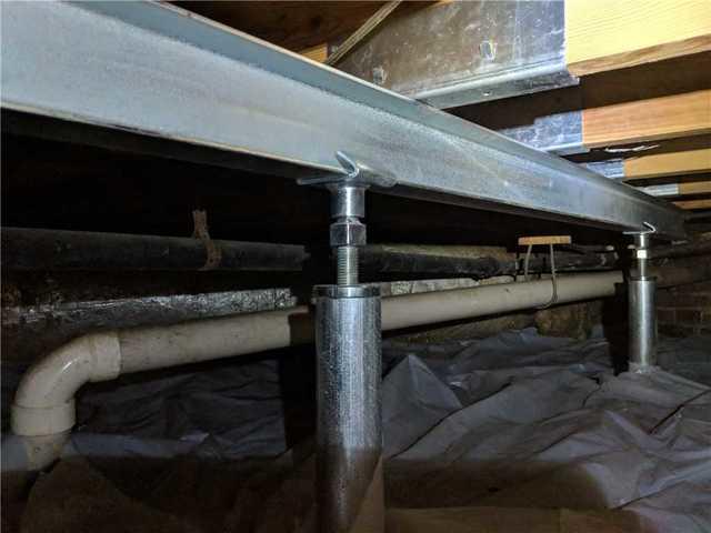 This is a photo of the SmartJack System with a PowerBrace supporting multiple joists.