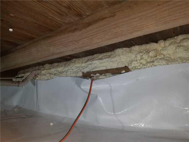 We insulated the rim joist and what little wall space existed in this crawl space with spray foam insulation. This will ensure a total seal of this crawl space.