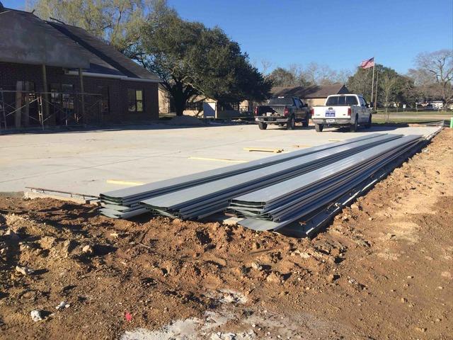 Ernie Smith Sons Roofing Commercial Roofing Photo Album Commercial Roof Replacement Using Metal Roofing In Friendswood Tx