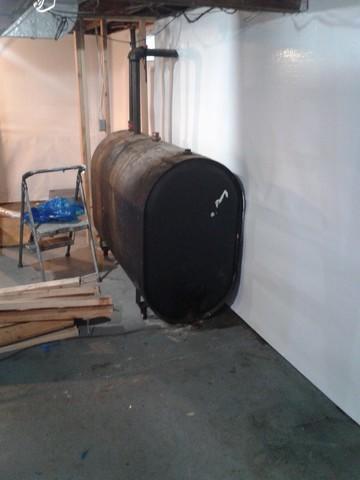 We laid CleanSpace along the perimeter walls and behind the boiler.