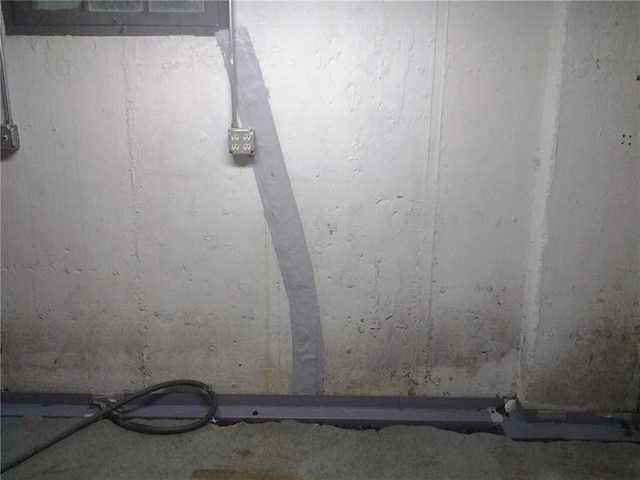 <p>Our FlexiSpan product seals the crack and keeps water from leaking through the foundation crack. It also connects with the perimeter waterproofing system as you can see in this picture, allowing water to freely flow to the sump pump instead of collecting on your basement floor.</p>