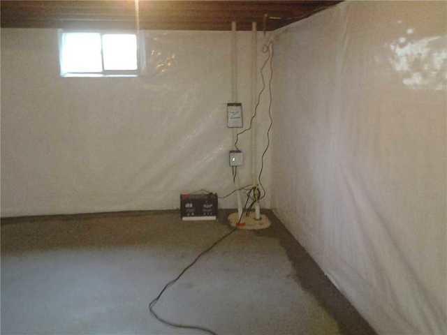 <p>Installed, the TripleSafe Sump Pump and CleanSpace walling gives the basement a more attractive look. The WaterGuard System is installed along the perimeter to keep the floor dry. The back-up battery on the floor will turn on in case this homeowner loses power, allowing the sum pump to keep your basement dry even when everything else fails.</p>