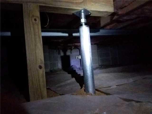 Larry needed a total of 12 SmartJacks and eight PowerBraces to stabilize the subfloor of his home.