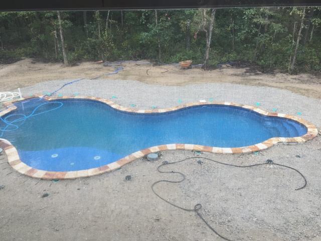 With construction of this pool completed, the homeowners had Y.E.S. contractors prepare to lay cement around the pool