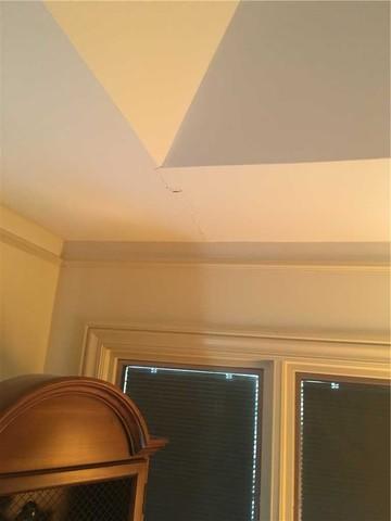John noticed cracks in his drywall near his master bath.