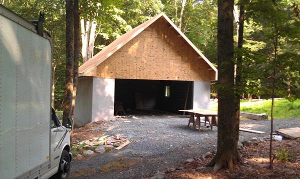 Roof of garage being added.