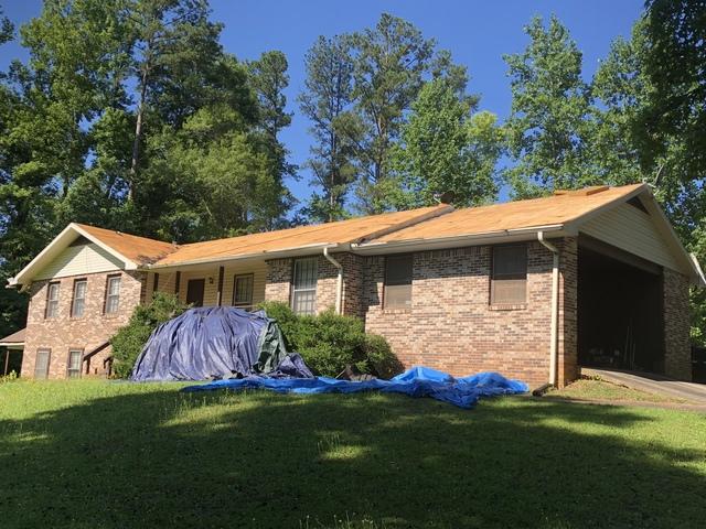 Removing the Old, Worn Out Roof Shingles