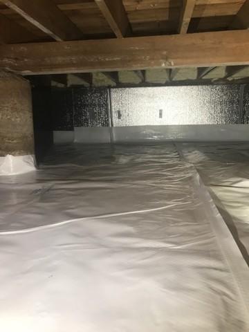 View of the encapsulated dirt floor with SilverGlo insulated wall panels installed