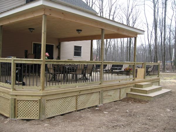 A deck roof was installed allowing the homeowners to enjoy their deck even during summer rainstorms.