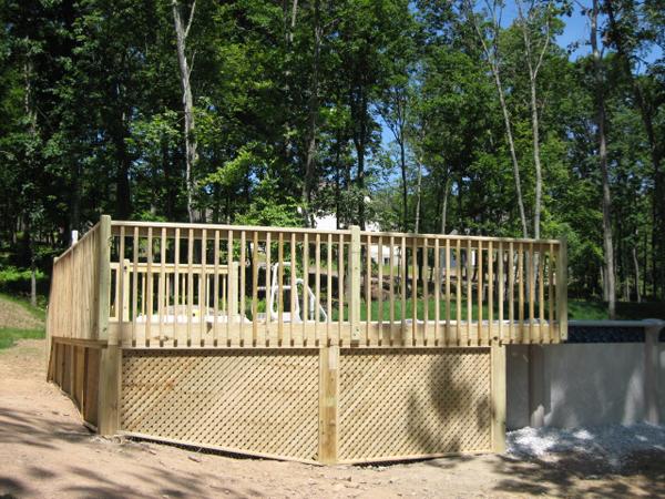 Complete look at the newly installed deck by the pool.