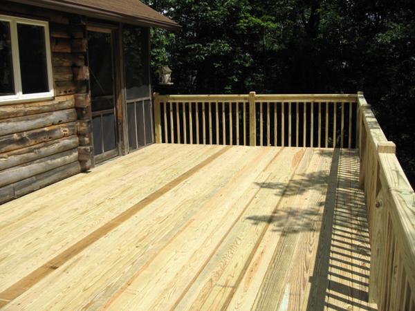 Deck view of the entrance and the surrounding fence. 