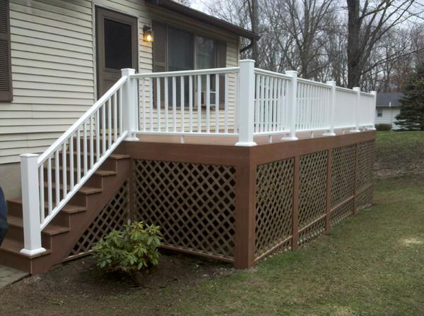 White fence really compliments the dark brown color of the deck. 