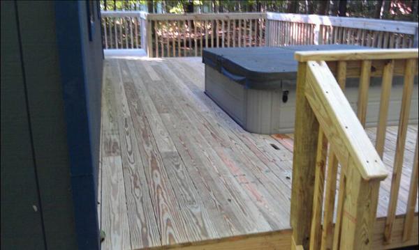 Newly built deck built around the already installed hot tub.