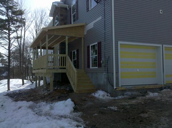 Newly built deck and stairs in the back.