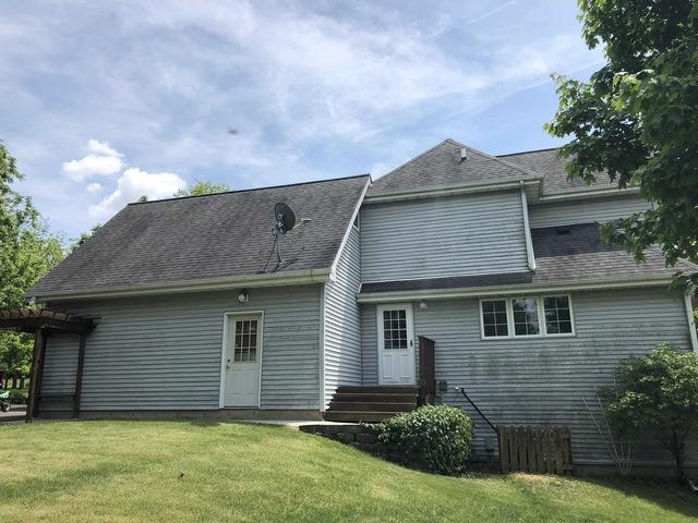 The shingle delamination was visible from quite a distance. Kyle wondered how long an asphalt shingle roof should last. An asphalt roof has a lifespan of about 20 to 25 years.