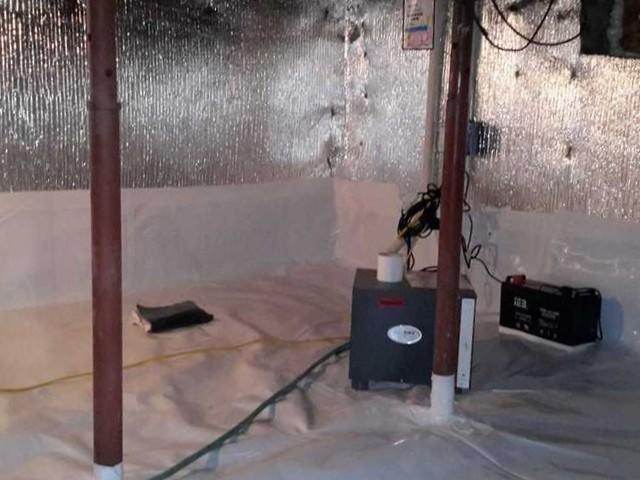 Our team -	Installed a heavy-duty sump pump specifically designed for crawl spaces and the homeowners opted for a battery back-up to protect the space in the event of power failure. To help further with the damaging humidity, we installed the efficient and near-maintenance-free Sedona dehumidifier.