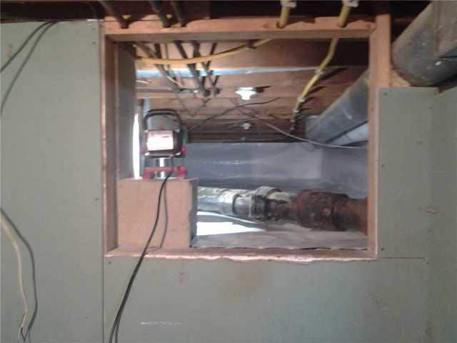 Entrance into crawlspace