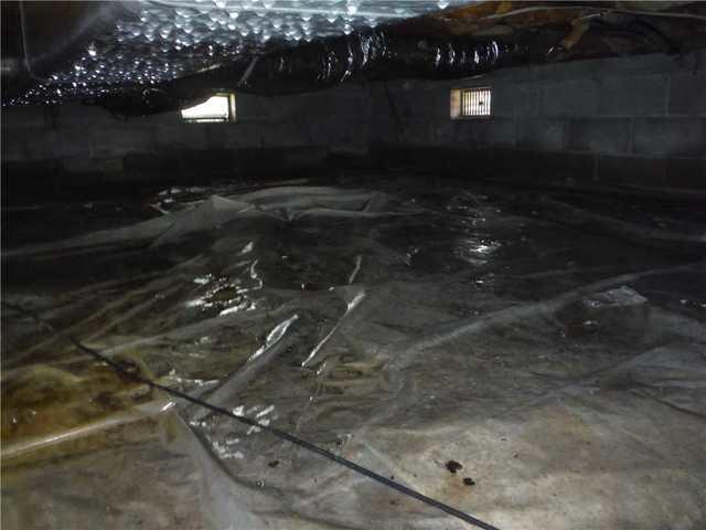 A Wide View of the Standing Water in this Crawl Space in Georgetown, DE
