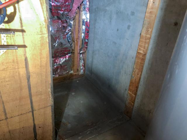 Water is also getting under the stairs leading to the basement.  Matt Clark's team will install the WaterGuard System under the stairs and the wall to the next room.