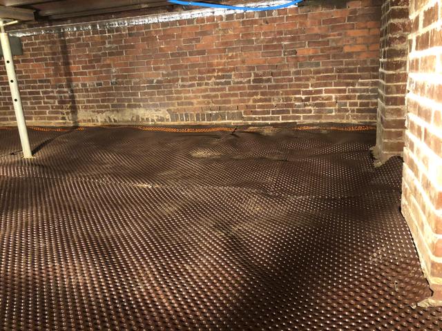 Installing Drainage Matting in Crawl Space