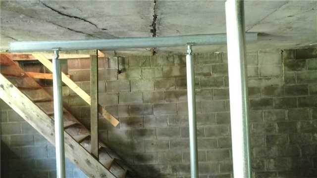 SmartJacks and Steel Beams Support Ceiling