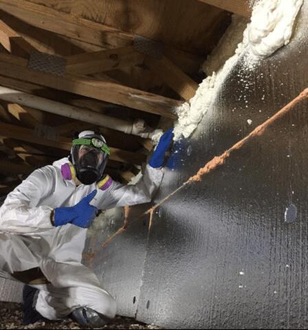 A great shot of one of our team members next to a newly installed SilverGlo Wall Panel. These wall panels are top of the line, between their high quality thickness and reflective exterior they are a great option when insulating ones home.