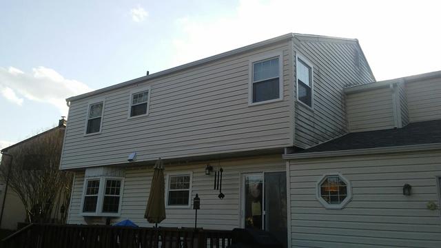 This photo shows the custom shaped needed for the project. The octagon window, different sized double hungs, a bay, etc.