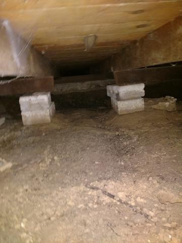 Before picture of crawl space