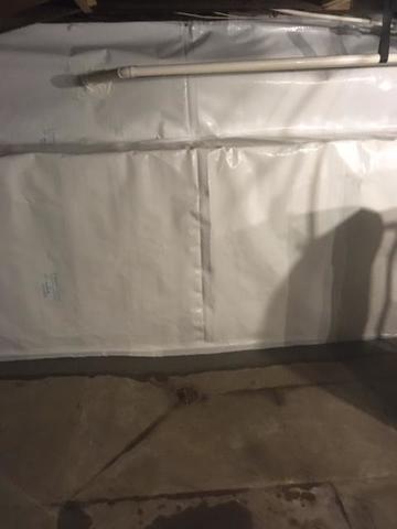 A CleanSpace vapor barrier has been installed on the basement walls to help prevent moisture and vapor from entering the basement. It will also direct any water that enters through the walls downward into the drainage system.