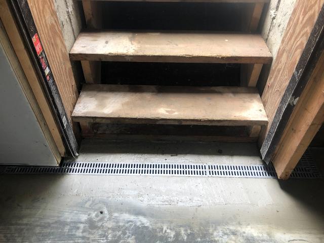 Here is the trench drain.  We install this at the bottom of the bulkhead stairs.  It will collect any water and make it go directly into the WaterGuard System.